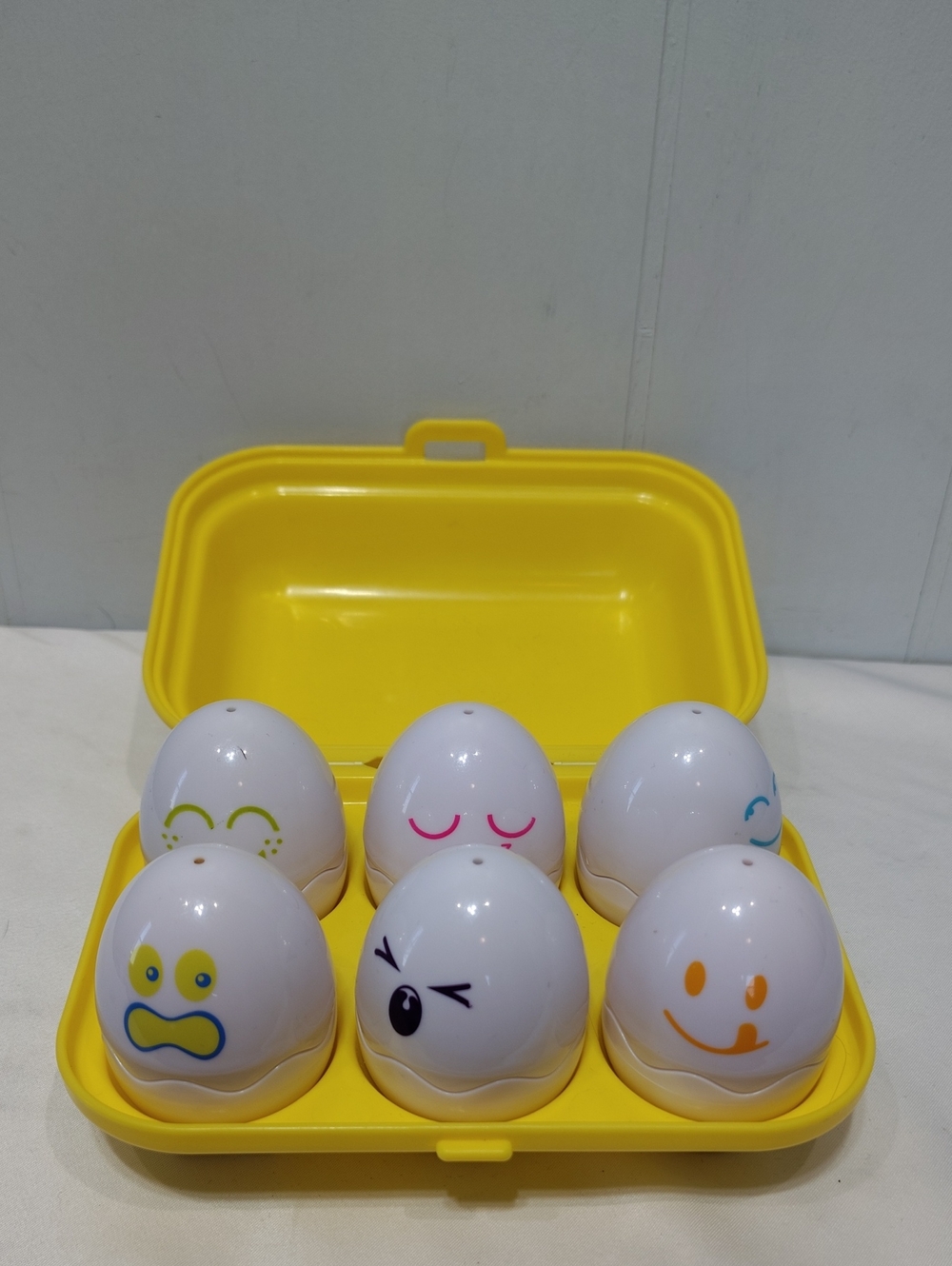 Tomy Yellow Egg Toy Set with Assorted Face Expressions Matching Colors Shapes